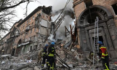 Russia carried out a deadly salvo of missile attacks on the southern Ukrainian city of Zaporizhzhia on October 6. Rescuers are seen here working at a site of a residential building heavily damaged the strike.