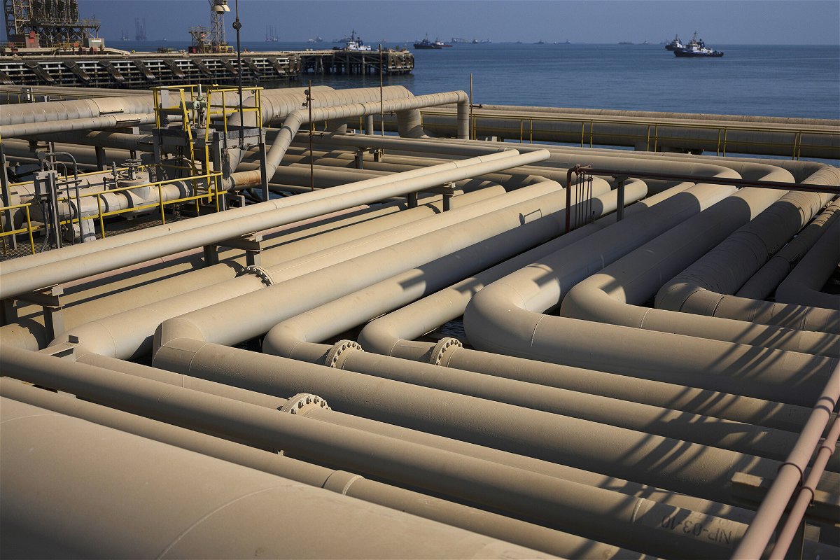 <i>Simon Dawson/Bloomberg/Getty Images</i><br/>Oil pipelines sit on the quayside beside the Arabian Sea in Saudi Aramco's Ras Tanura oil refinery and oil terminal in Ras Tanura