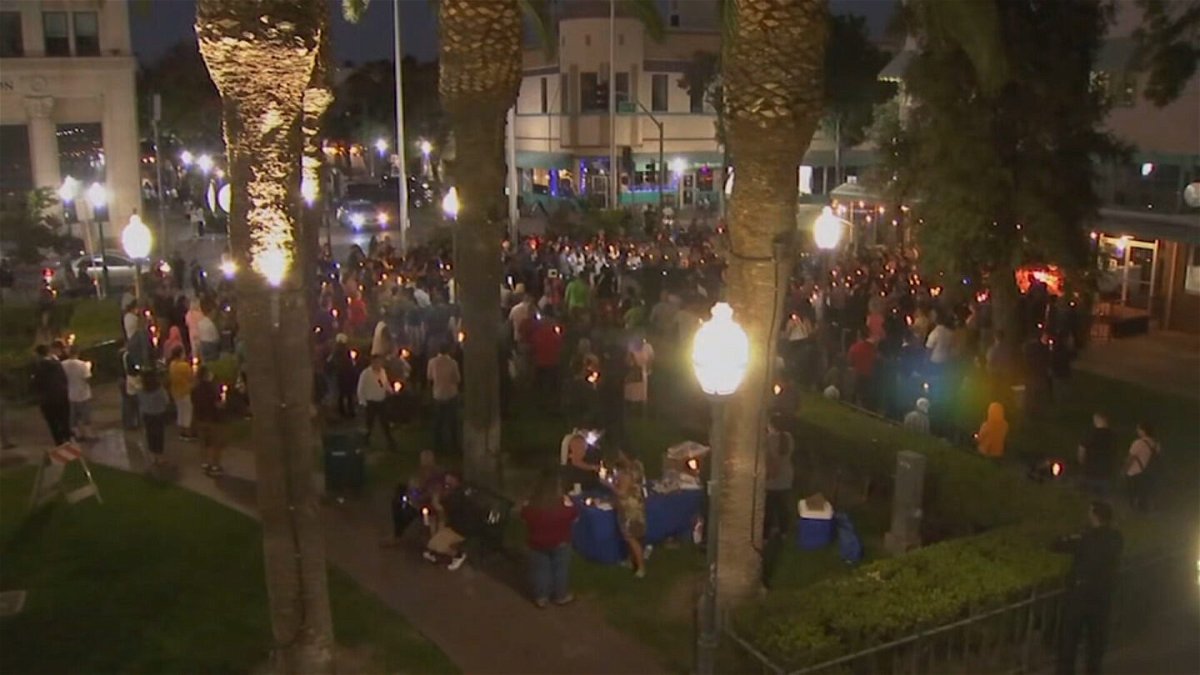 <i>KFSN</i><br/>People attend a candlelight vigil for the Singh family at Bob Hart Square in Merced