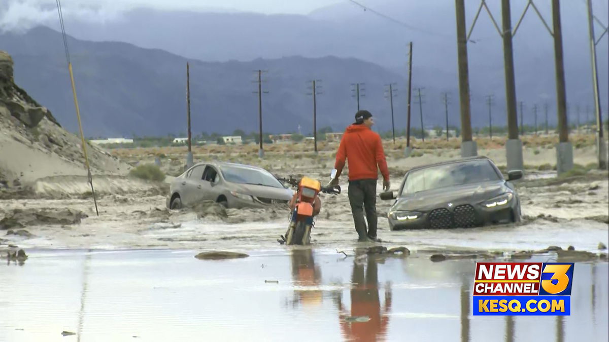 Roads closed after several vehicles were trapped by flooding on N