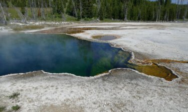 The Abyss Pool hot spring is seen in the southern part of Yellowstone National Park