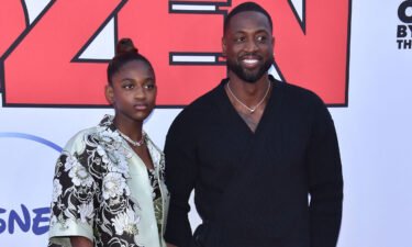 Dwayne Wade (right) and his daughter Zaya Wade arrive for the "Cheaper by the Dozen" Disney premiere in Hollywood on March 16. Wade is firing back after his ex-wife accused him of trying to exploit their transgender daughter