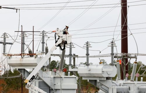 Duke Energy personnel work to restore power at a second crippled electrical substation after the Moore County Sheriff said that vandalism caused a mass power outage