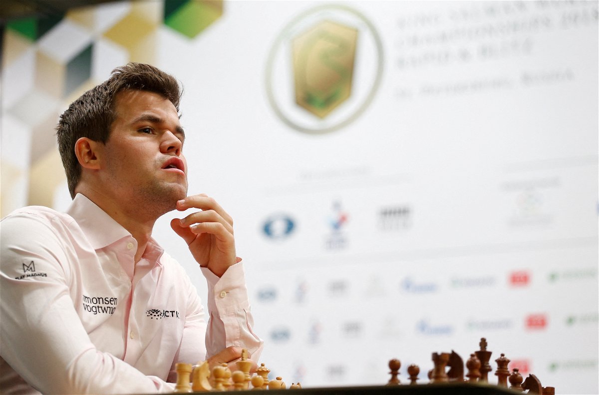 <i>Anton Vaganov/Reuters/FILE</i><br/>Magnus Carlsen of Norway sits in front of a chess board before a game.