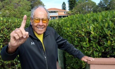 Nick Bollettieri gestures outside his home on January 7