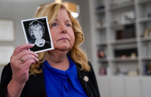 The "Times Square Killer" admitted five additional cold-case killings Monday in a New York court. A photo of victim Diane Cusick is shown by Nassau County District Attorney Anne Donnelly.