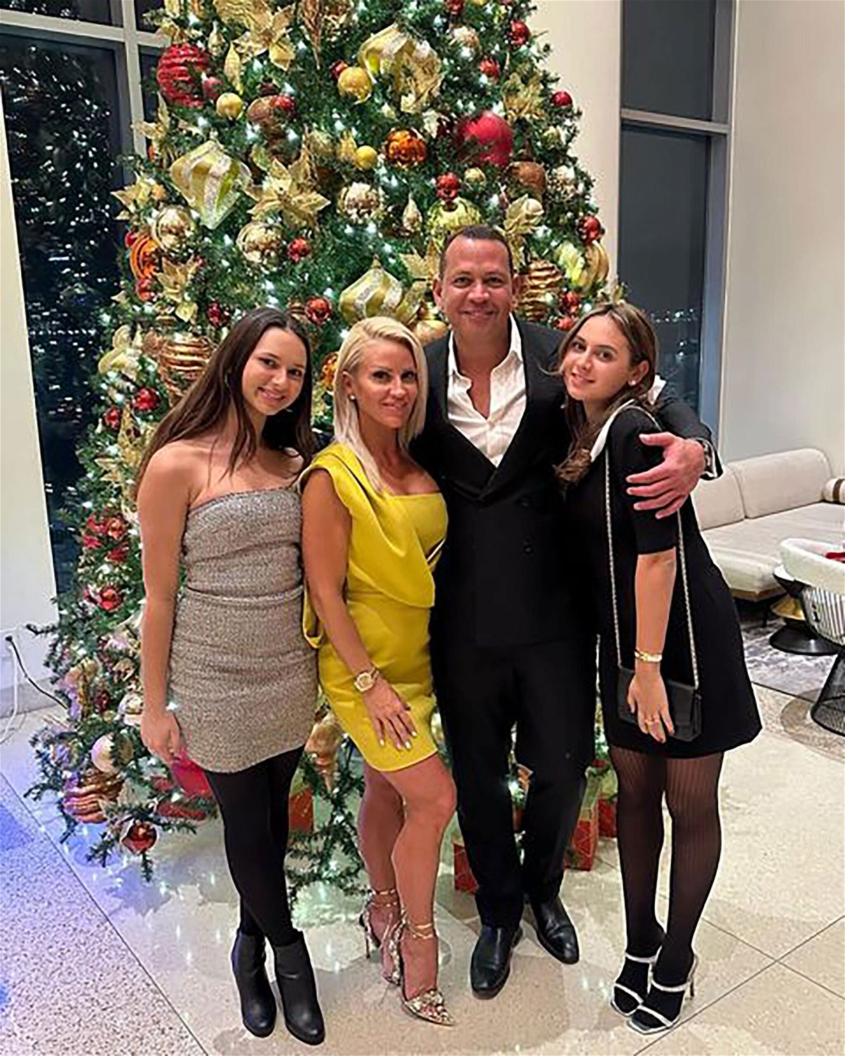 <i>From Alex Rodriguez</i><br/>Alex Rodriguez (center right) is celebrating the holidays in New York this year.