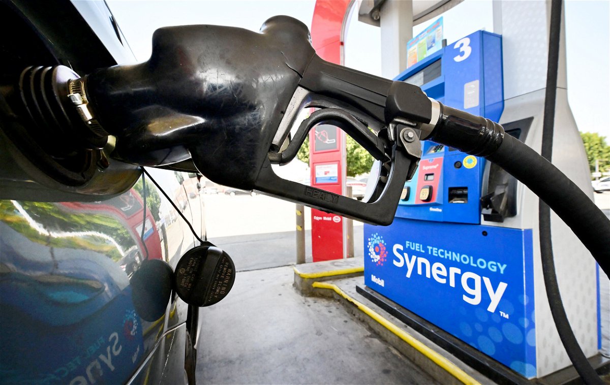 <i>Frederic J. Brown/AFP/Getty Images</i><br/>Prices at the pump continue to plunge. A gasoline nozzle pumps gas into a vehicle in Los Angeles