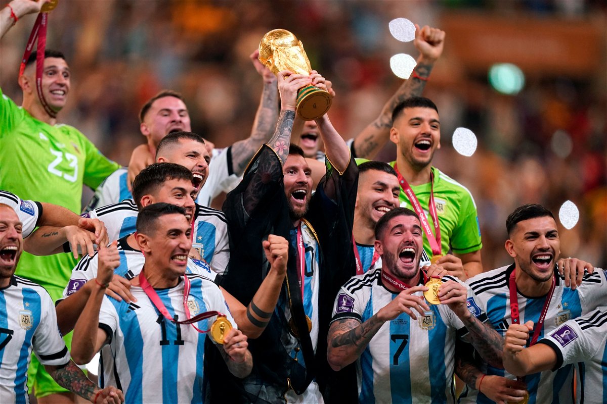 <i>Mike Egerton/AP</i><br/>The bisht worn by Lionel Messi (center) during World Cup celebrations has split opinion.
