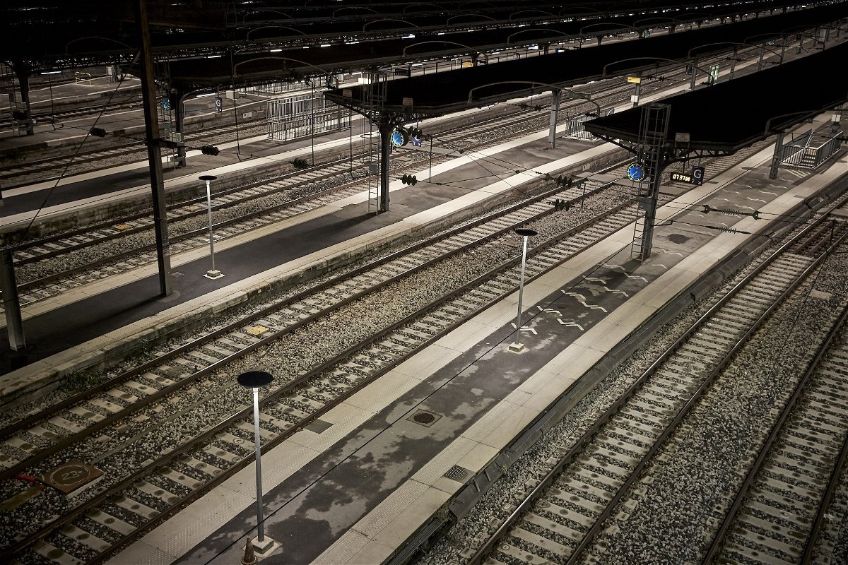 <i>Kiran Ridley/Getty Images</i><br/>Train tracks lie empty at Gare de l'Est railway station in Paris as France is hit by widespread traffic disruption amid a nationwide strike against proposed pension reforms.