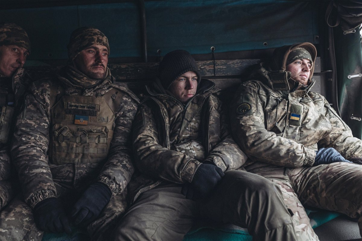 <i>Diego Herrera Carcedo/Anadolu Agency/Getty Images</i><br/>Ukrainian soldiers work in their artillery unit in January.