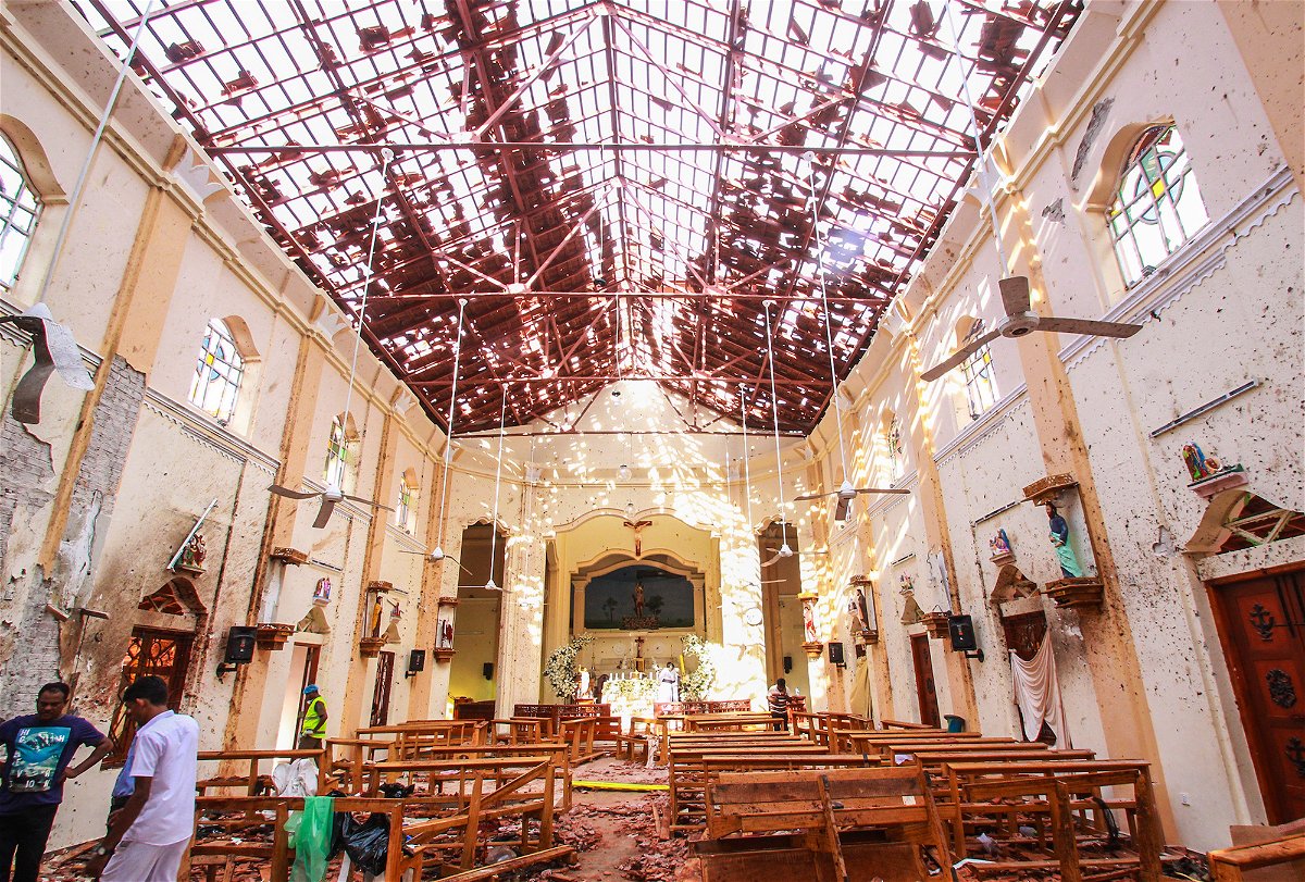 <i>Stringer/Getty Images</i><br/>Sri Lankan officials inspect St. Sebastian's Church in Negombo