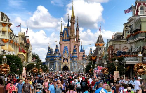 Crowds fill Main Street USA in front of Cinderella Castle at the Magic Kingdom on the 50th anniversary of Walt Disney World in Lake Buena Vista
