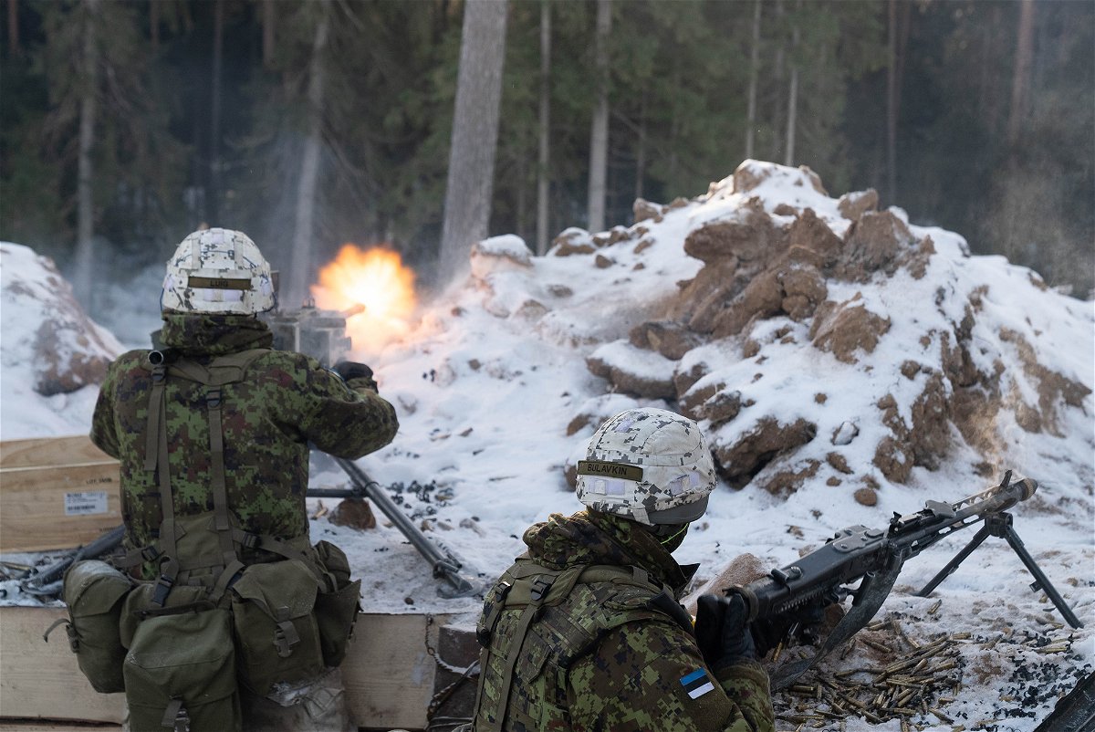 <i>Joseph Ataman/CNN</i><br/>Estonian troops fire at French mountain commandos attacking their position as part of a NATO exercise in Estonia.