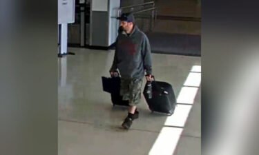 An airport surveillance camera image shows alleged suspect Marc Muffley at Lehigh Valley International Airport