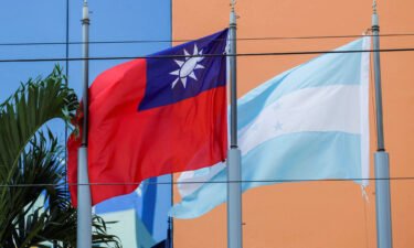 Taiwan recalls its ambassador to Honduras as ties between the two countries worsen. The flags of Taiwan and Honduras are seen outside the Taiwan Embassy in Tegucigalpa