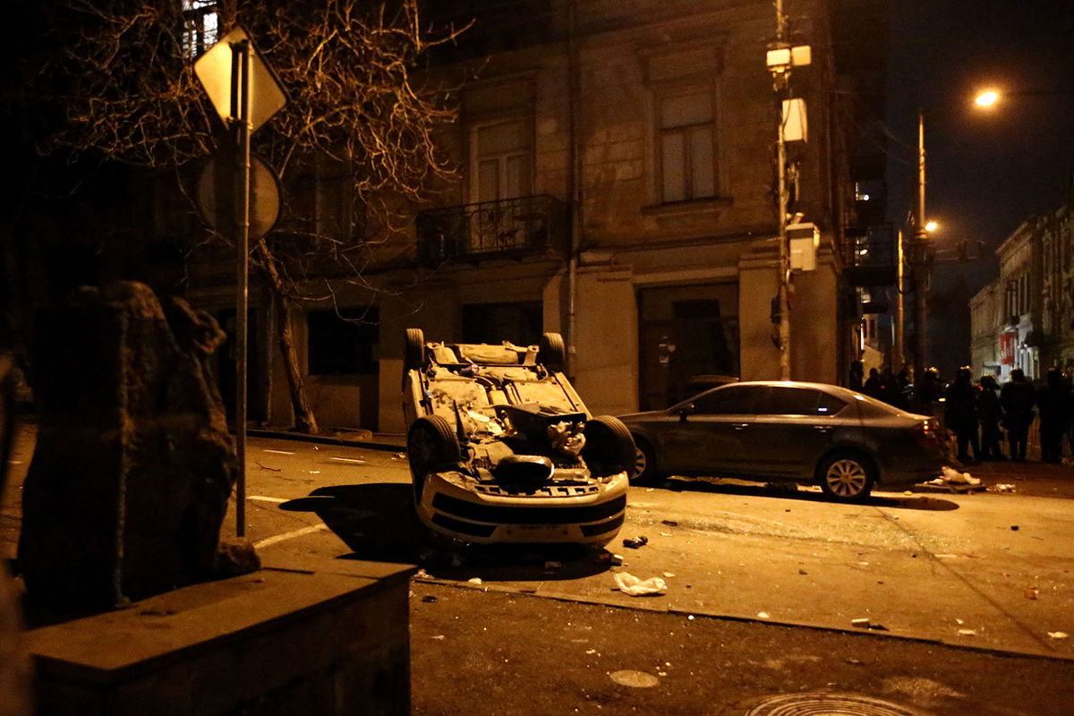 <i>Zurab Tsertsvadze/AFP/Getty Images</i><br/>Protesters clash with police in Tbilisi early on March 9.