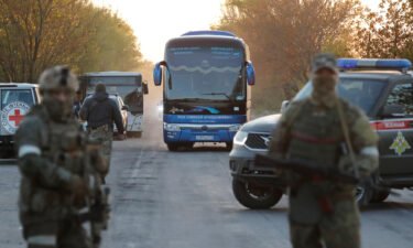 A bus carrying civilians evacuated from the Azovstal steel plant in Mariupol arrives in the village of Bezimenne in Ukraine's Donetsk region on May 6