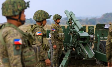 Filipino soldiers prepare for shelling during a combined field artillery live-fire exercise as part of the US-Philippines Balikatan military exercises