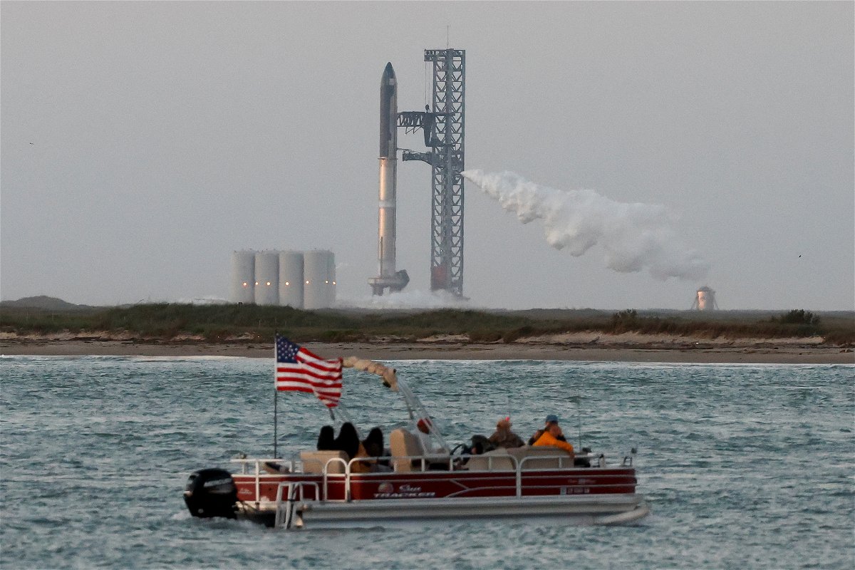 <i>Joe Skipper/Reuters</i><br/>SpaceX's Starship is seen from the company's Boca Chica launchpad  near Brownsville