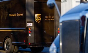 UPS says the US economy is slowing down. Delivery trucks are here parked outside a UPS hub in Brooklyn.