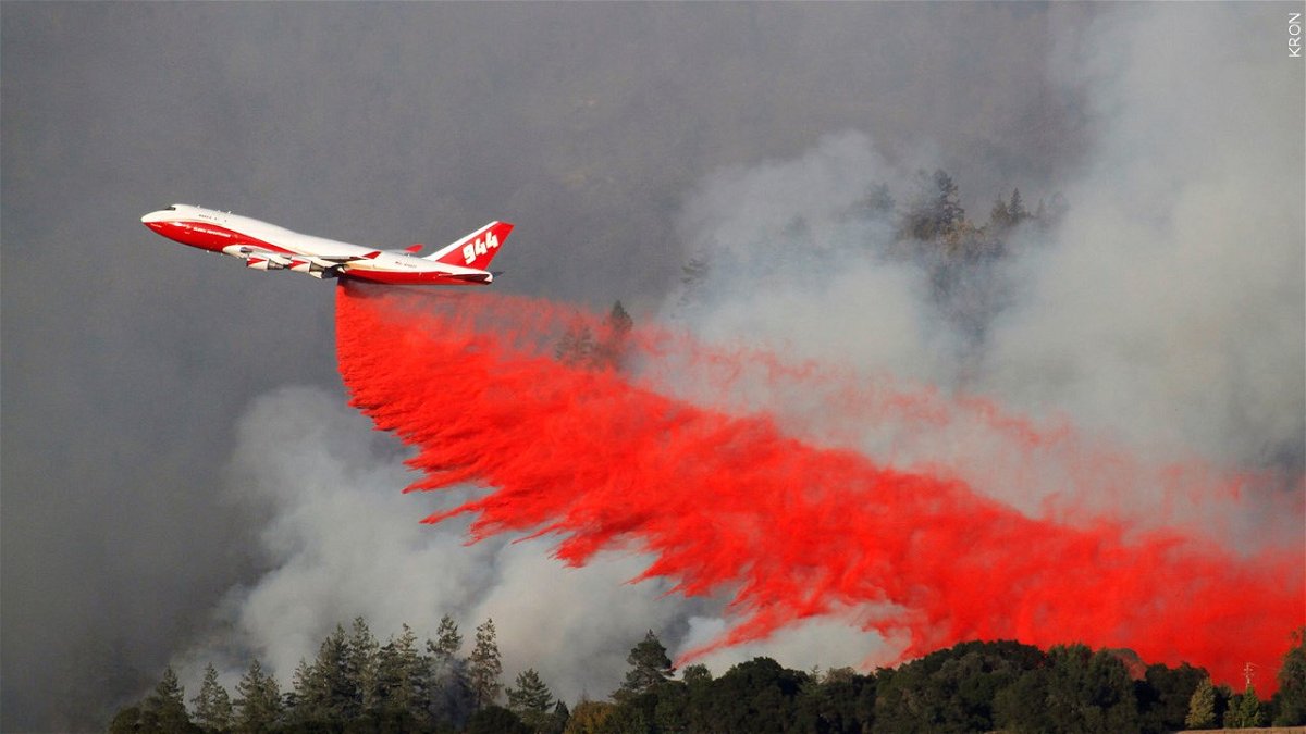 PHOTO: View of the Pocket Fire in Northern California as a 747 Fire Tanker drops a load of fire retardant, Photo Date: undated
