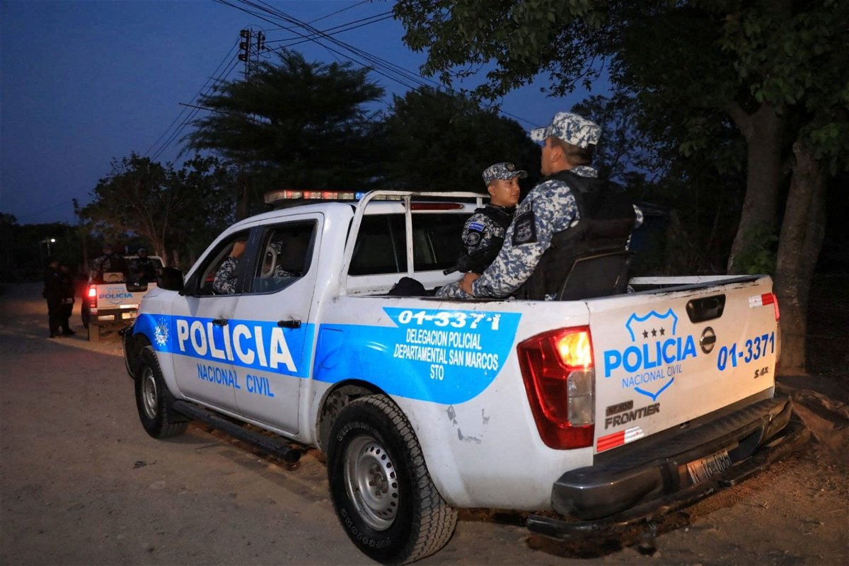 <i>Secretaria de Prensa de la Presidencia/Handout/Reuters</i><br/>Police officers patrol Nueva Concepcion on May 17.