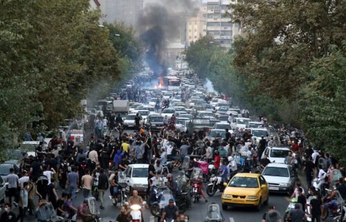 Protesters are seen here in downtown Tehran
