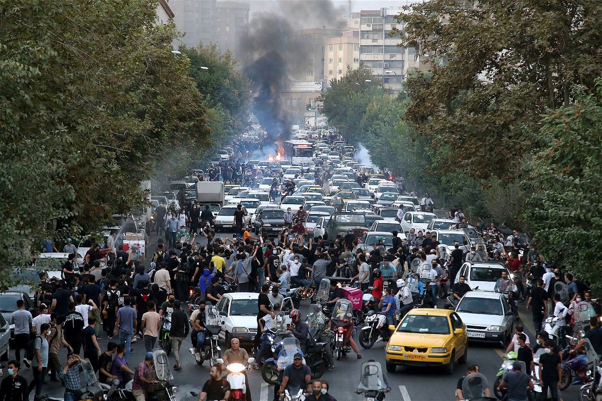<i>AP</i><br/>Protesters are seen here in downtown Tehran