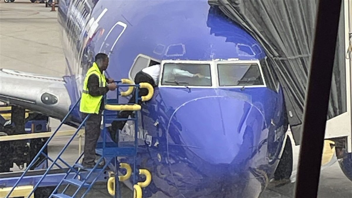 <i>Courtesy Matt Rexroad</i><br/>A Southwest pilot had to to crawl through an airplane window after a customer accidentally locked the flight deck door