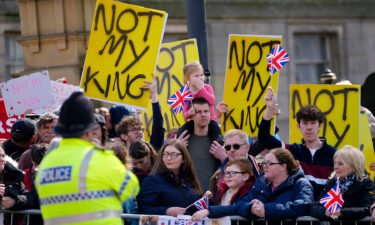 Protestors wait for the arrival of King Charles III and Camilla on April 26 in Liverpool