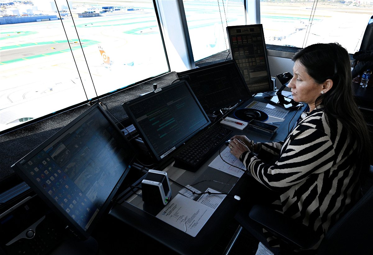 <i>Brittany Murray/Long Beach Press/Getty Images</i><br/>Mayra Raya-Cruz is pictured here working air traffic control during the holiday travel rush at Los Angeles International Airport in Los Angeles in December 2022.  Air traffic control in the United States is understaffed by about 3