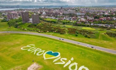 An aerial view of a giant mural of the Eurovision 2023 logo incorporating the Ukrainian flag adorns the dips at New Brighton on May 11