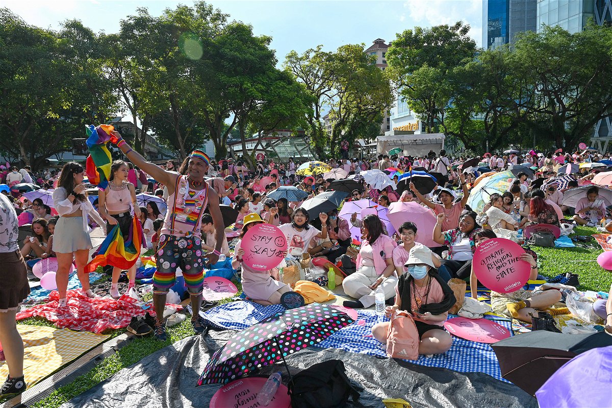 <i>Roslan Rahman/AFP/Getty Images</i><br/>Gay rights supporters attend the annual Pink Dot event in Singapore in June 2022.
