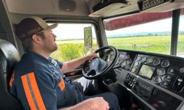 Tyler Pickering driving his tow truck.