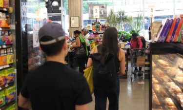 People shop at Lincoln Market on June 12