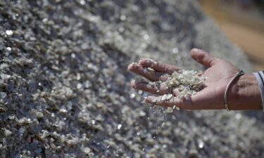 A worker of Sigma Lithium Corp SGML.V takes samples at the Grota do Cirilo mine in Itinga