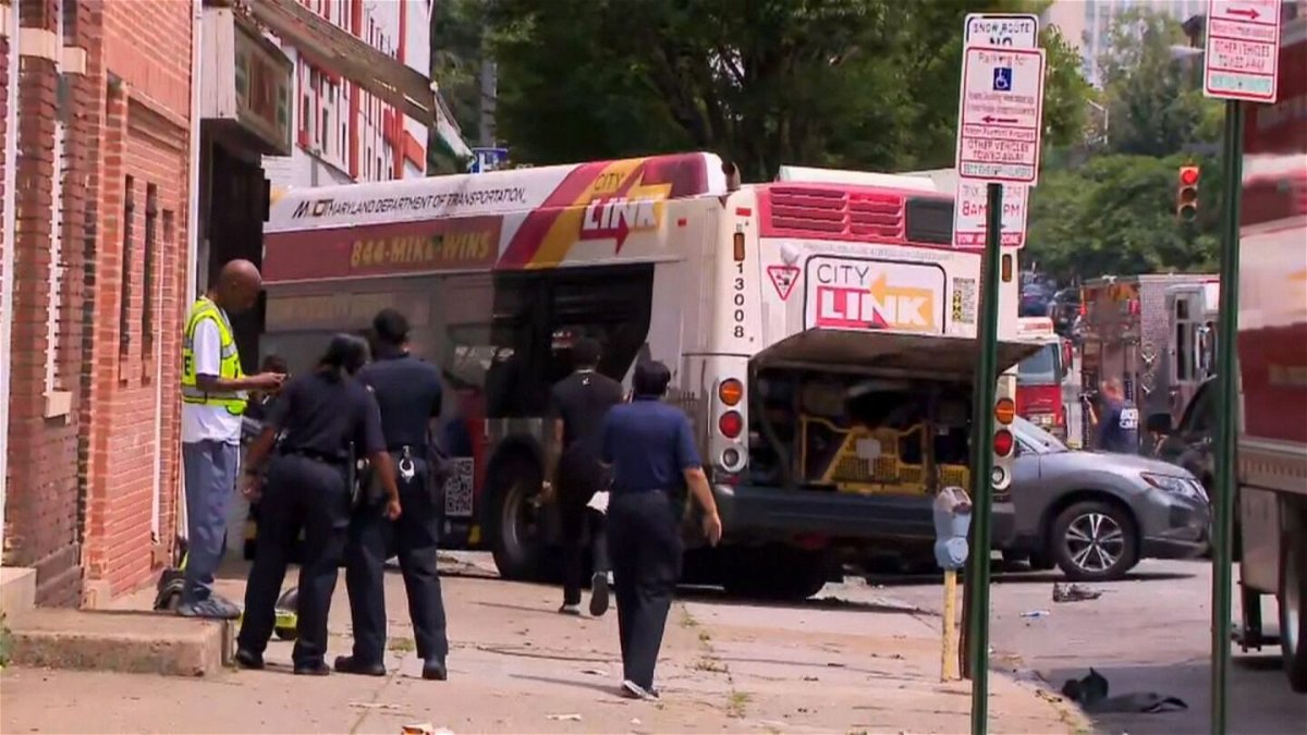 <i>WJZ</i><br/>Baltimore City Police told CNN an MTA bus collided with a Lexus at North Paca Street at West Mulberry Street in downtown Baltimore Saturday morning.