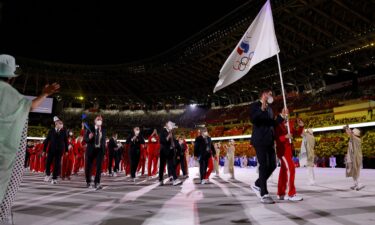 Russian athletes participate in the opening ceremony parade during the Tokyo Olympics in 2021.