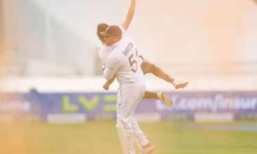 Jonny Bairstow picks up a Just Stop Oil protester at Lord's Cricket Ground on June 28.