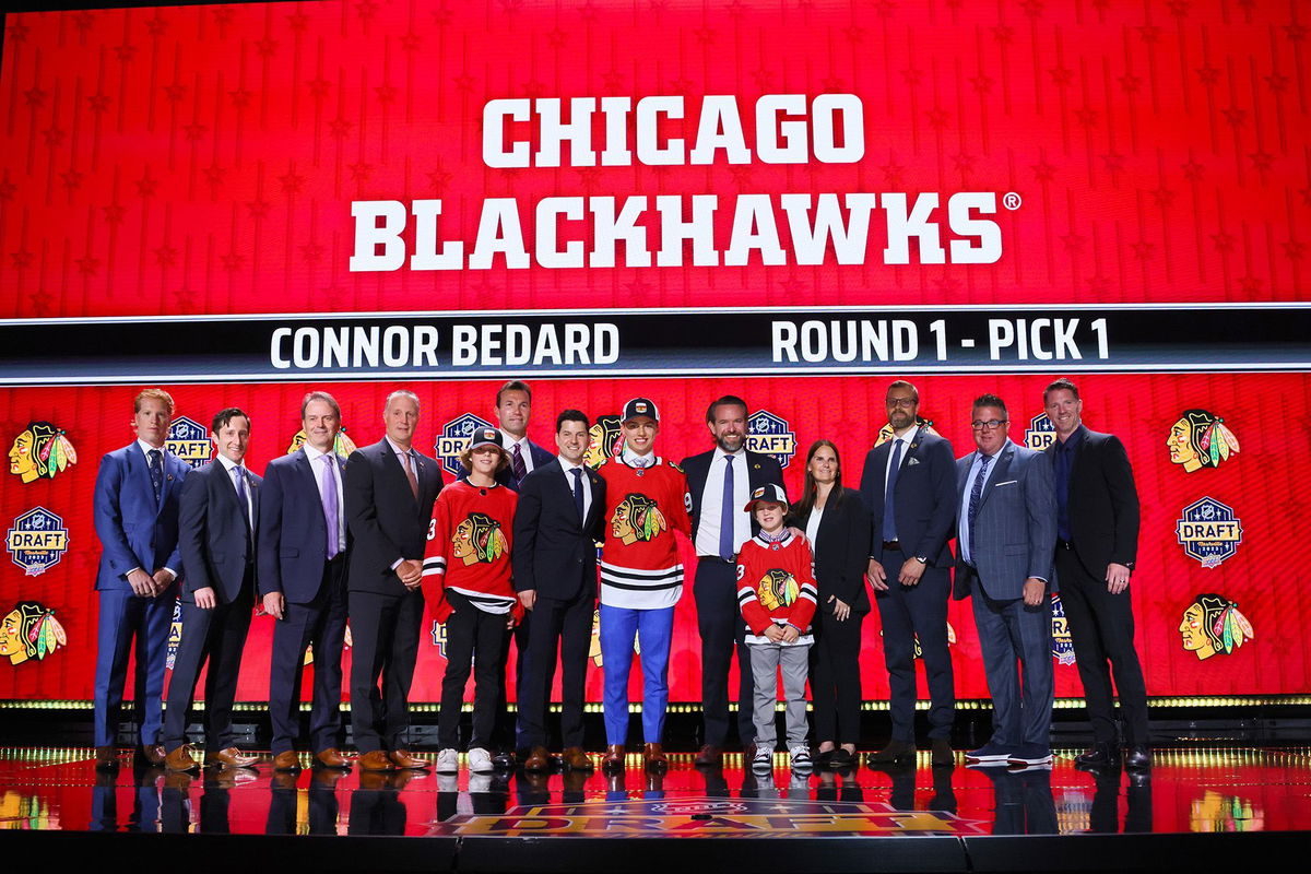 <i>Bruce Bennett/Getty Images</i><br/>Bedard (center) was selected by the Blackhawks with the first overall pick of the NHL Draft.