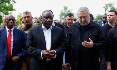South African President Cyril Ramaphosa and Ukraine's Prosecutor General Andriy Kostin visit a site of a mass grave