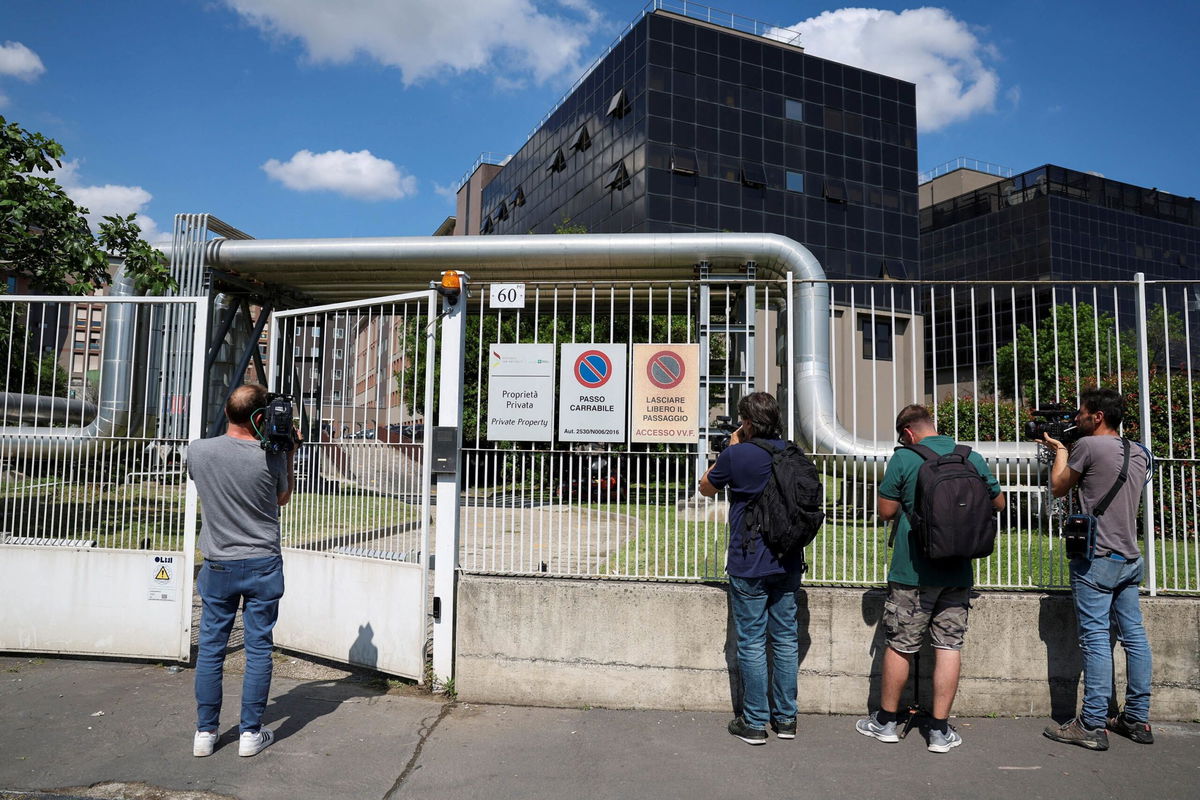 <i>Claudia Greco/Reuters</i><br/>Media outside the San Raffaele hospital