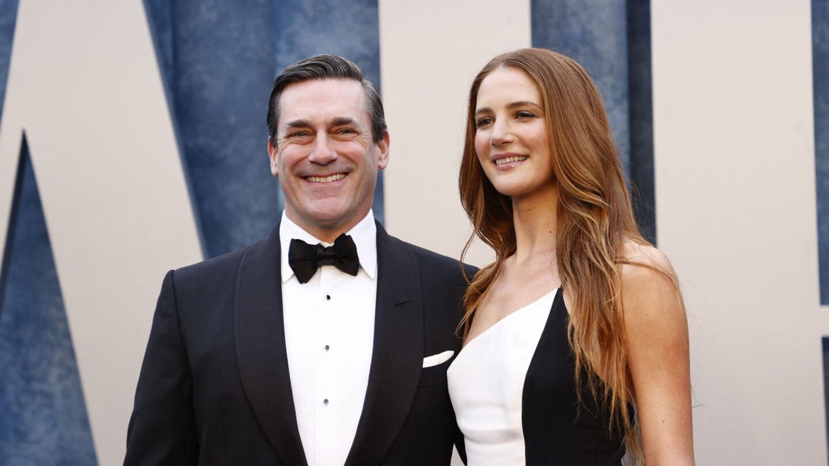 <i>Michael Tran/AFP/Getty Images</i><br/>(From left) Jon Hamm and Anna Osceola are pictured here at the Vanity Fair Oscars after party in Beverly Hills in March.