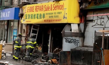 The charred remains of the e-bike repair and sales store in the Chinatown area of Manhattan early Tuesday.