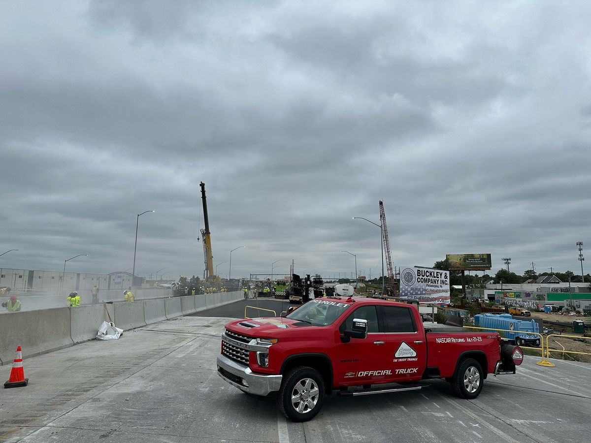 <i>Pocono Raceway</i><br/>Raceway workers standing by to help at the scene of the I-95 collapse in Philadelphia.