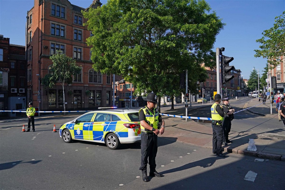 <i>Jacob King/PA Images/Getty Images</i><br/>Police officers line a street in Nottingham on Tuesday