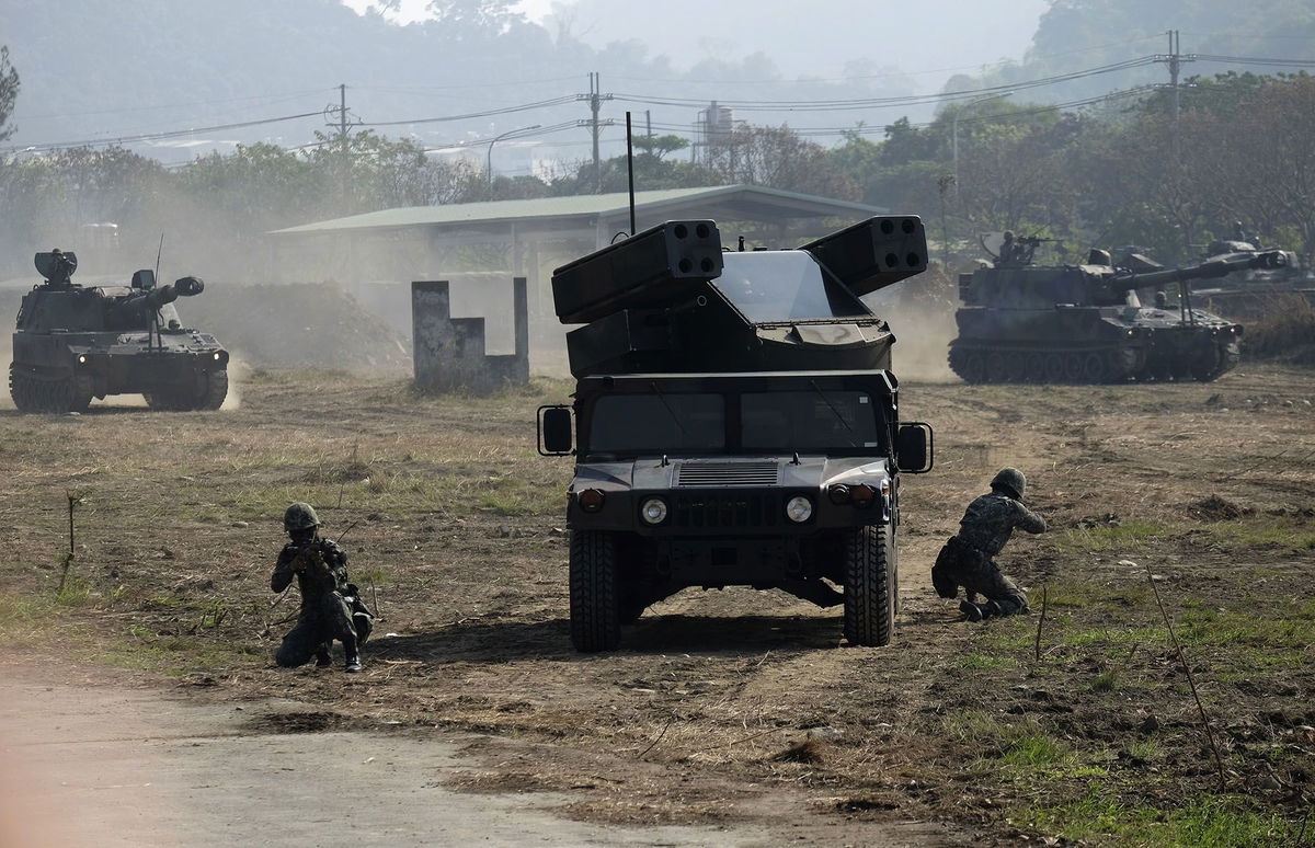 <i>Sam Yeh/AFP/Getty Images</i><br/>Soldiers hold positions next to a US-made Avenger air defense missile system launcher during an annual military drill in Taichung