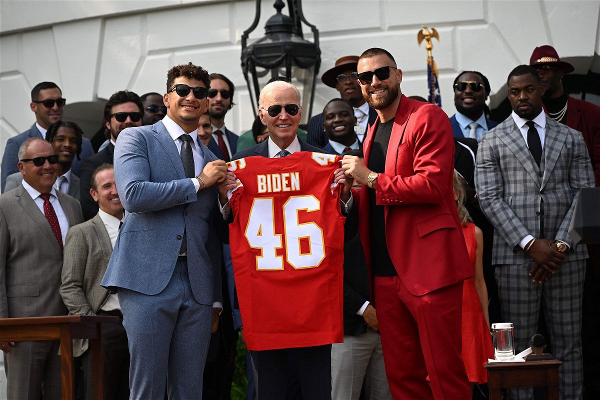 <i>Andrew Caballero-Reynolds/AFP/Getty Images</i><br/>Kansas City Chiefs tight end Travis Kelce and quarterback Patrick Mahomes present President Joe Biden with a jersey during a celebration for the Kansas City Chiefs