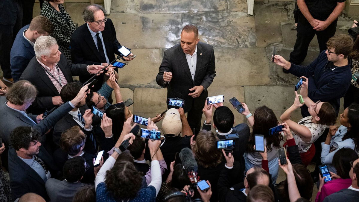 <i>Haiyun Jiang/The New York Times/Redux</i><br/>House Minority Leader Hakeem Jeffries speaks to reporters on Capitol Hill in Washington on May 30.